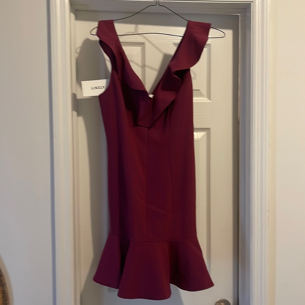 Beautiful plum colored dress from Likely. Size 8. New with tags!
